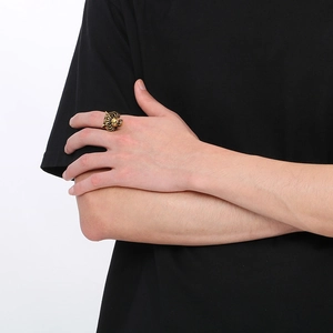 Golden tiger head zodiac ring for men in retro stainless steel style worn by model