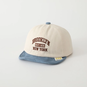 Detail of Brooklyn embroidery on a two-tone cotton baseball cap for toddlers