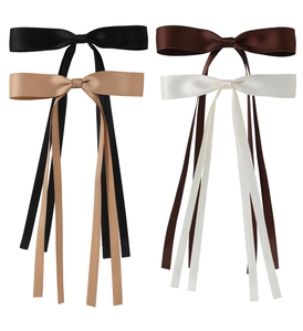 Detailed set of 4 satin bow hair clips in black, beige, brown, and white with long ribbons