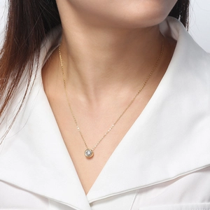 Elegant S925 sterling silver gold necklace with a round solitaire bubble pendant on model