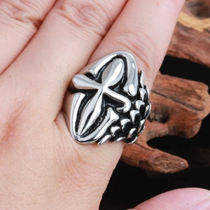 Vintage stainless steel cross ring for men featuring detailed embossed silver patterns
