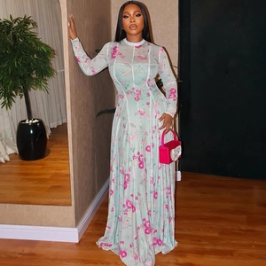 Floral long sleeve A-line dress in mint green with pleated waist and round neck style