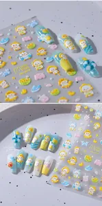 Detail of 3D embossed nail stickers with cartoon duck, crab, and summer beach patterns
