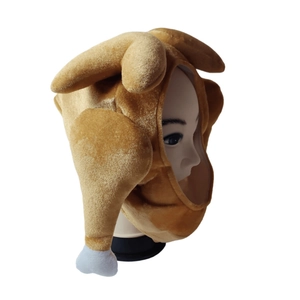 Detail of plush turkey hat with drumstick decorations for Thanksgiving parties