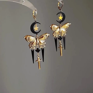 Vintage gothic crescent moon and golden butterfly earrings with hanging dagger charms
