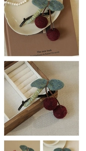 Detailed views of a cherry hair claw clip with red wool felt fruit and green leaves