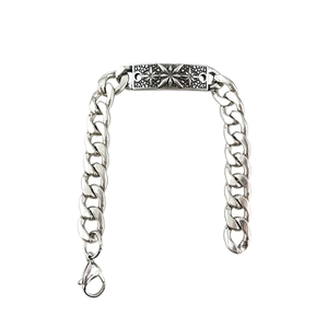 Retro silver cuban chain bracelet for men with engraved starburst pattern plaque