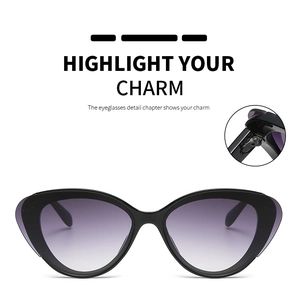 Detail view of reinforced metal hinges and purple gradient lenses on cat eye sunglasses