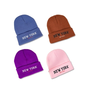 NEW YORK embroidered knit beanies in blue, brown, purple, and pink soft ribbed fabric
