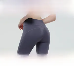 Detail der hoch taillierten Yogahose in Dunkelgrau-Violett mit doppelseitigem Nylon-Spandex