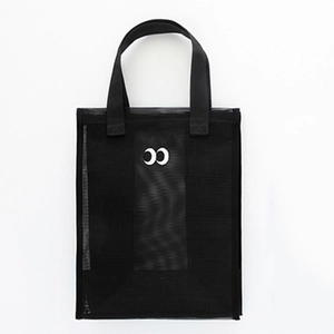 Black mesh beach tote bag featuring white crescent logo and durable carry handles