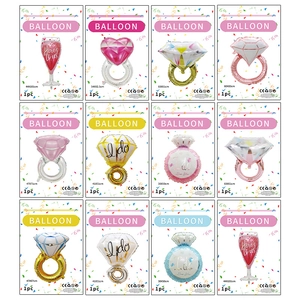 Diamond ring and champagne aluminum foil balloons for wedding party venue decoration