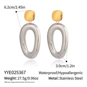 Detail view of two-tone stainless steel oval earrings with dimensions and weight specs