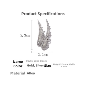 Detail specifications of silver wing brooch made of alloy and stones with dimensions 5.3x2.2cm