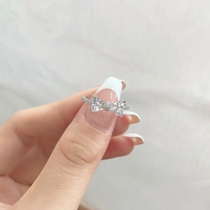 Elegant S925 sterling silver bow ring with heart zircons and pavé diamonds for women