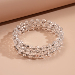 Macro detail of three-layer glass beaded bracelet with sparkling crystal spacers