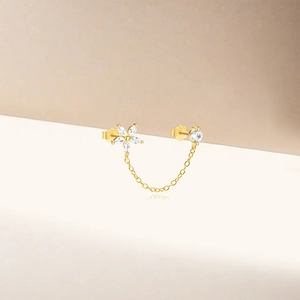 Macro shot of S925 sterling silver chain earrings with marquise-cut zircon flowers