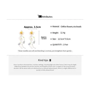 Detail view showing white chiffon flowers and seed bead tassels earrings with size specs