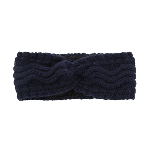Close-up of navy blue winter knitted headband with twist knot and wave texture