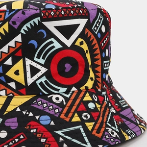 Detailed close-up showing the precise stitching and ethnic geometric pattern on a sun hat