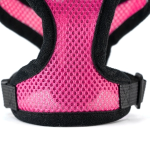Close-up of pink breathable mesh fabric and reinforced stitching on pet harness