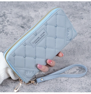 Blue long zipper wallet featuring heart embroidery and diamond pattern with wristlet