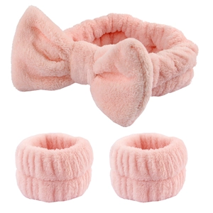 Pink coral fleece spa set with bow headband and matching absorbent wristbands