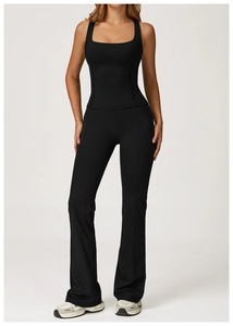 Detail view of black yoga set featuring a square neck tank top and flared high-waist leggings