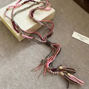 Bohemian multi-layer tassel pendant necklace with acrylic crystals and suede cords