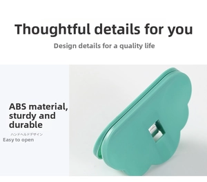Mint green cloud-shaped ABS food sealer clip with easy-to-open handheld design