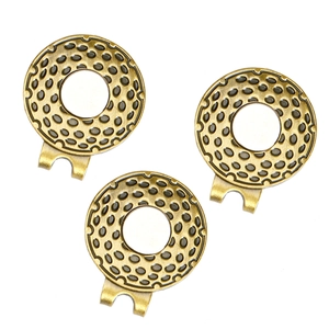 Close-up of golf ball textured magnetic hat clips in antique bronze finish