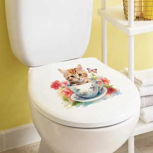 Detailed view of a cute cartoon cat in a floral teacup sticker on a white toilet lid