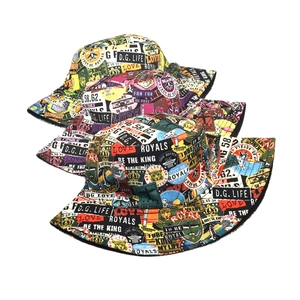 Three trendy graffiti bucket hats with retro letter prints in yellow, pink, and black