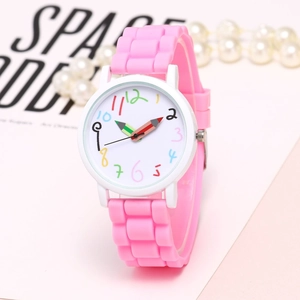Detailed view of kids quartz watch with pencil shaped hands and pink silicone strap