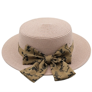 Women wide brim straw sun hat with floral bow ribbon for beach and travel protection