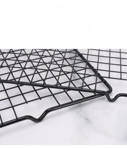 Macro detail of the thickened carbon steel cooling rack with non-stick black mesh coating