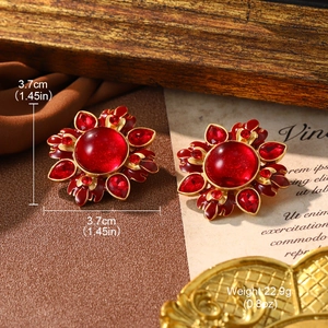Vintage gold flower stud earrings with red crystal stone and size specifications