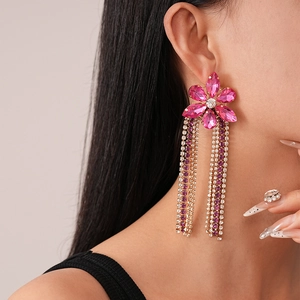 Elegant vintage flower tassel earrings with pink crystals and shimmering rhinestone fringe