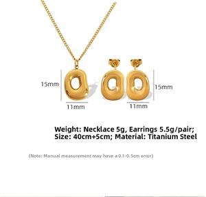 Detail view of 18k gold plated stainless steel irregular oval necklace and earring set
