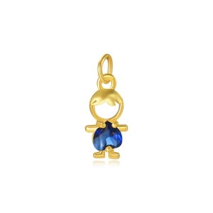 Detailed view of gold boy charm with blue heart gemstone for DIY jewelry making