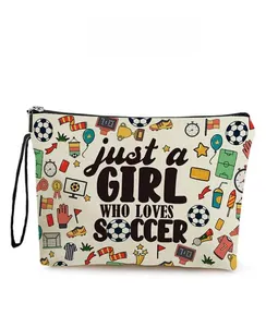 Detail of soccer canvas pouch with girl who loves soccer print and black zipper