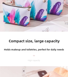 Detail of high capacity waterproof PU makeup bag with colorful feather prints and metal zipper