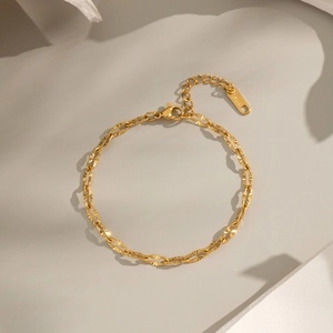 Textured gold snake chain necklace in stainless steel with lobster clasp and extension