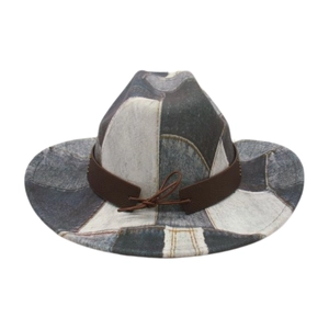 Vintage patchwork denim cowboy hat with a brown leather band for travel and vacations