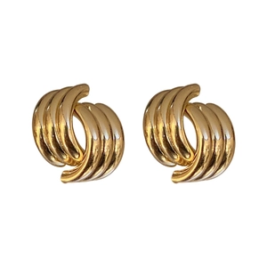 Minimalist geometric twisted gold metal earrings with high shine textured finish