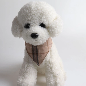 British style plaid bow tie and bell collar on a plush white pet toy dog accessory