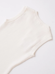 Detail of ribbed knit texture and premium stitching on white sleeveless starfish tank top