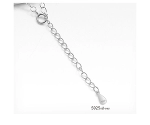 Detailed macro view of S925 sterling silver extension chain with lobster clasp and hallmark