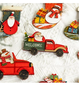 Detailed close-up of colorful wooden Christmas ornaments featuring Santa and Snowman designs