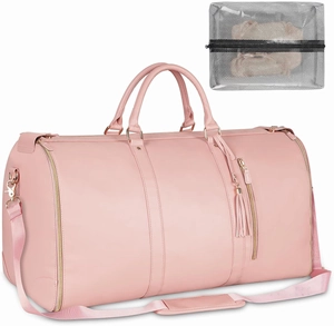 Pink travel bag with gold hardware, tassel detail, and black mesh storage organizer